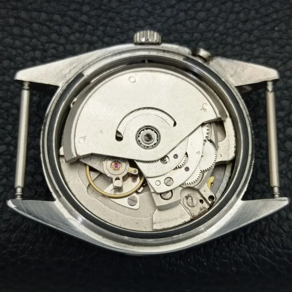 Vintage 1976 Ricoh Automatic Mens Silver Watch W/daydate & Gold accents